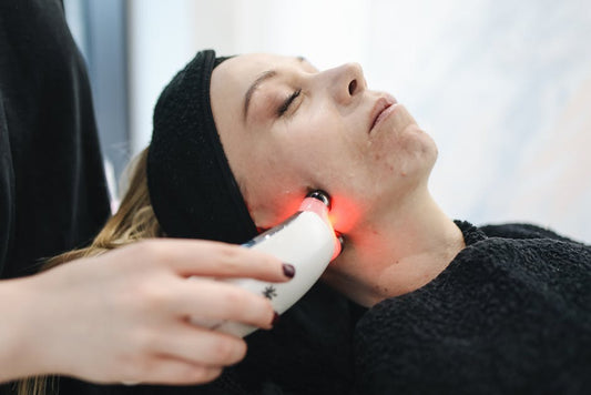Collection of at-home beauty tech devices including microcurrent wand