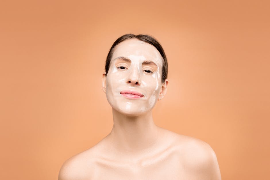 Skincare serum and beauty products on bathroom shelf
