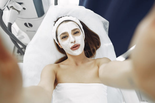 Woman with rejuvenated glowing skin after LED light therapy treatment